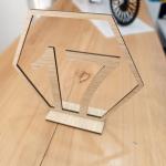 Wooden-like table stand.