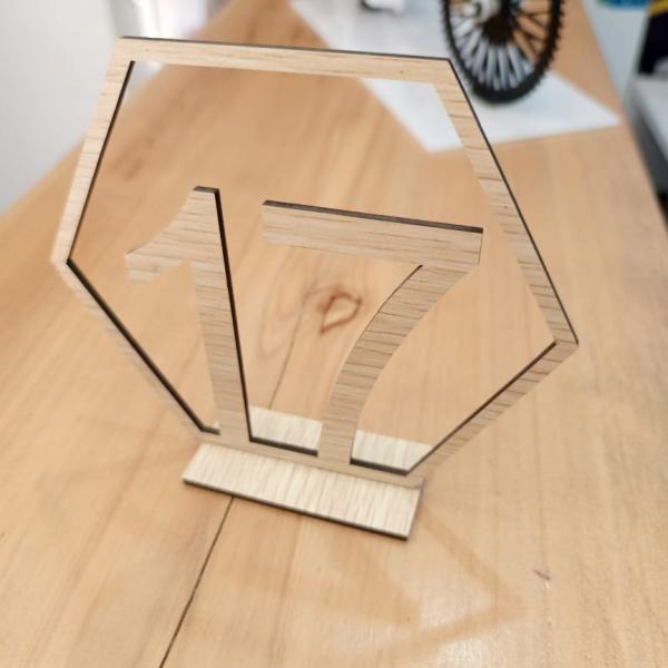 Wooden-like table stand.